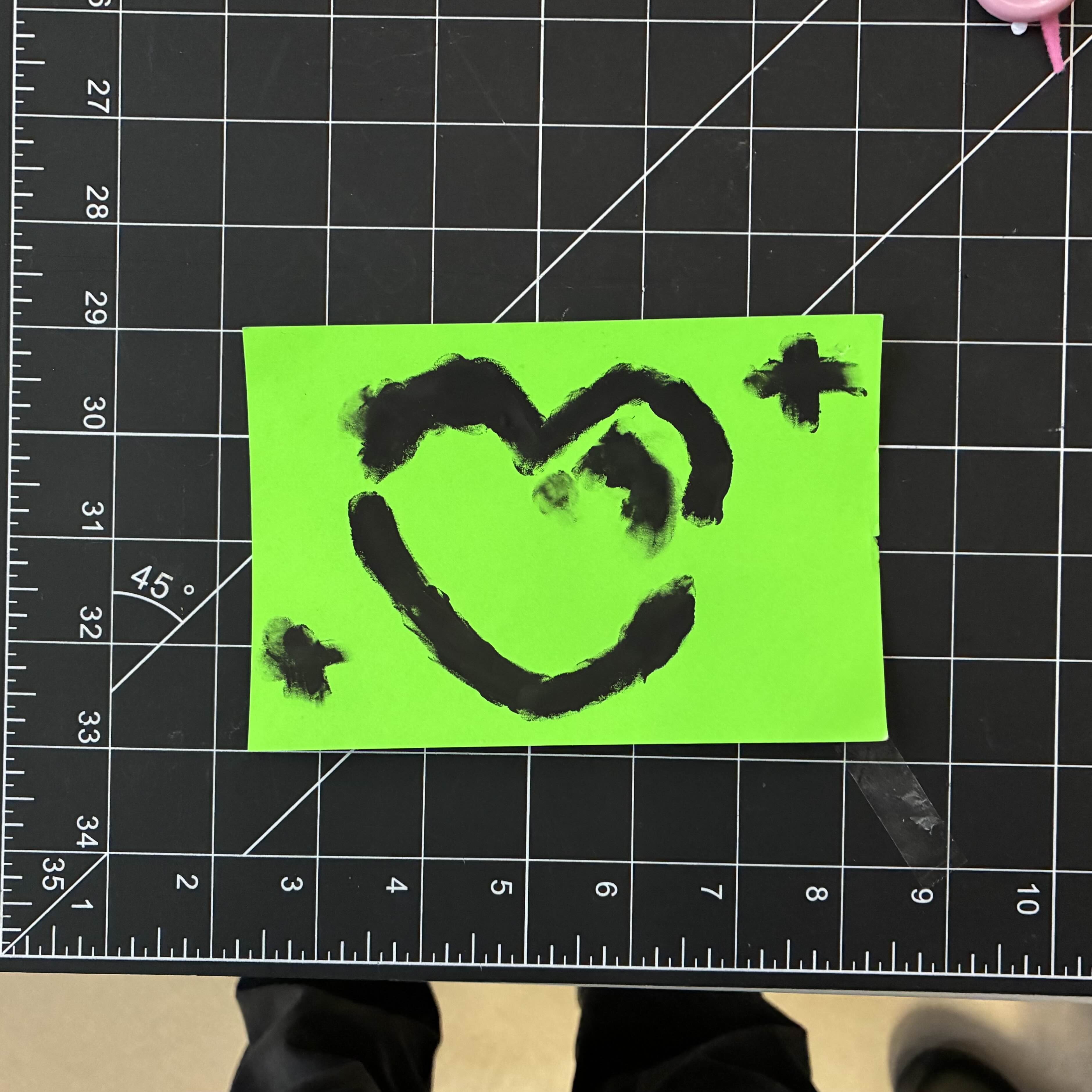 I used my finger to paint a heart using conductive paint.