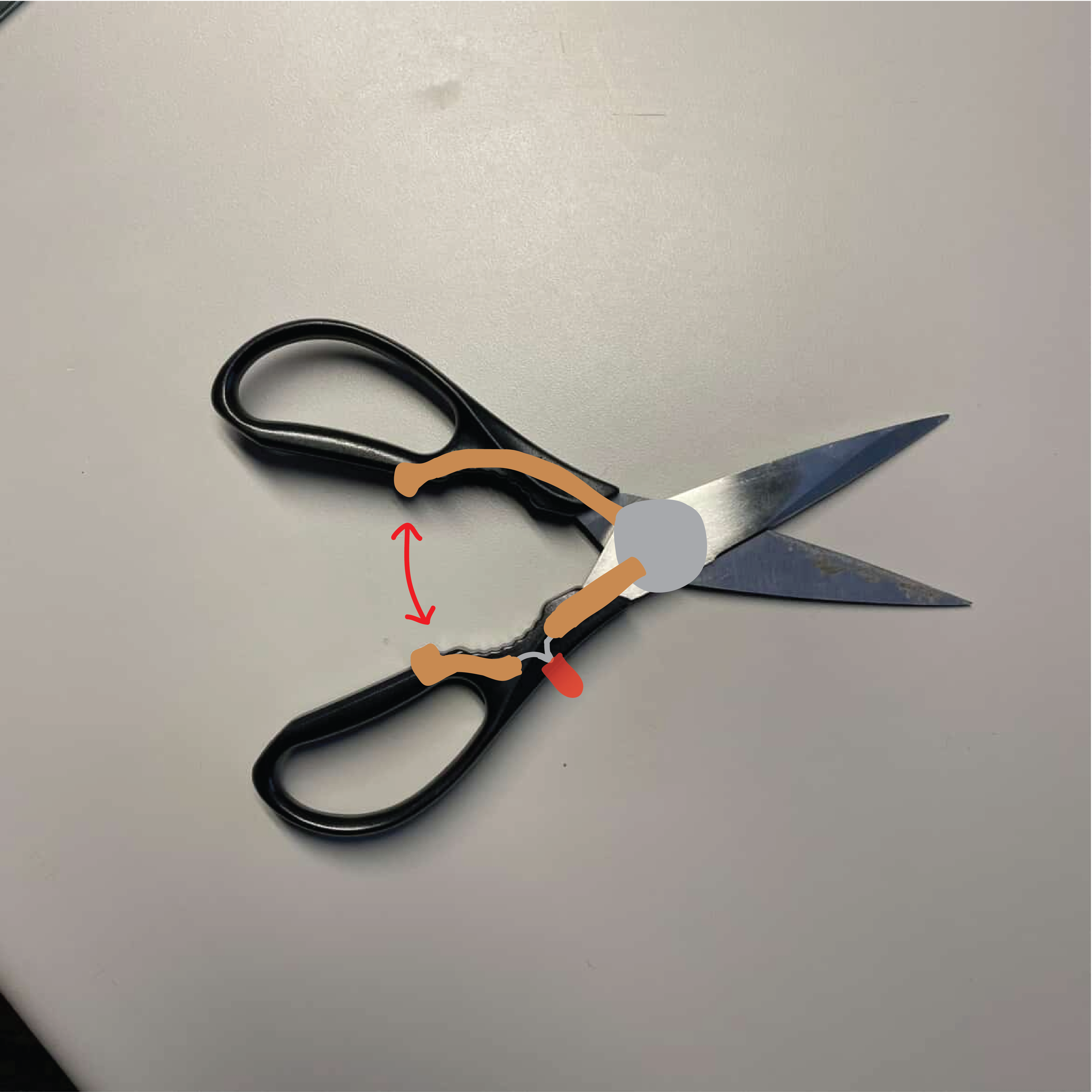 These are scissors from the classroom. There is copper tape on both handles that connects a battery that is at the bottom of the handles. There is an LED light on one side.
