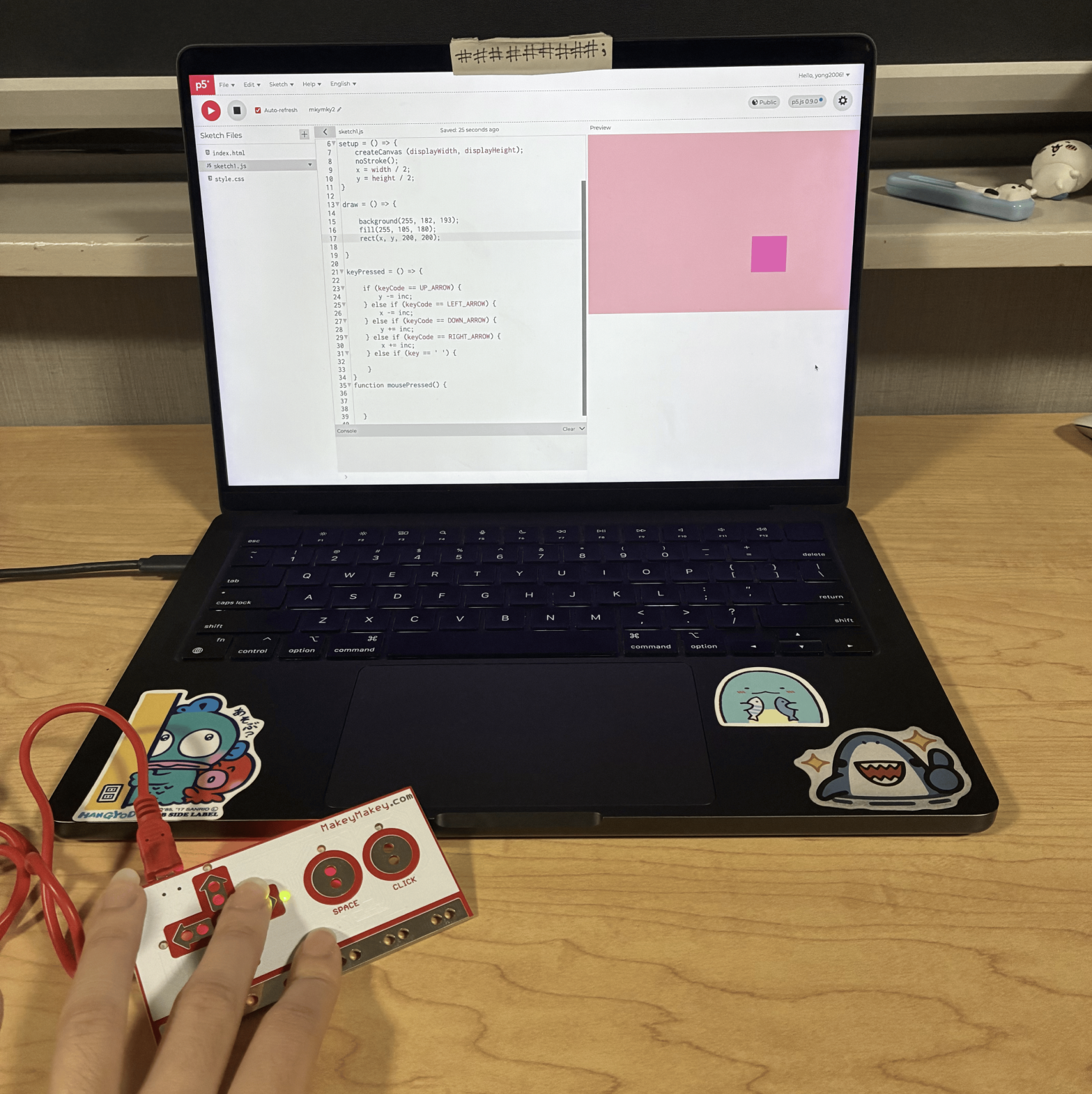 This was the second sketch where the user can move the circle around the canvas by clicking the arrow buttons on the Makey Makey. This is me clicking the down and left button to make the square move around the canvas.