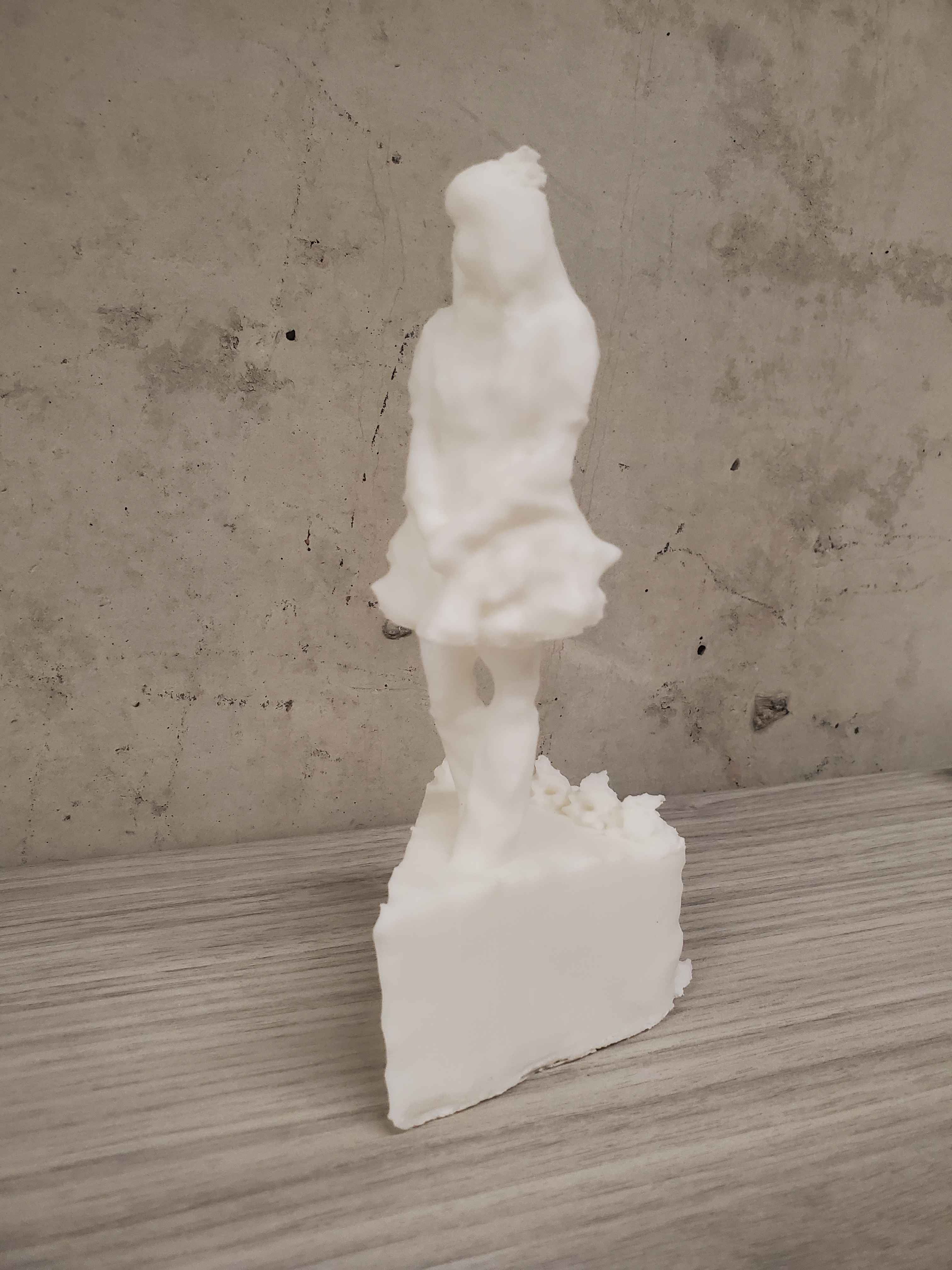 My final project, a full body print of myself standing on a slice of cake with whipped cream on my head. 